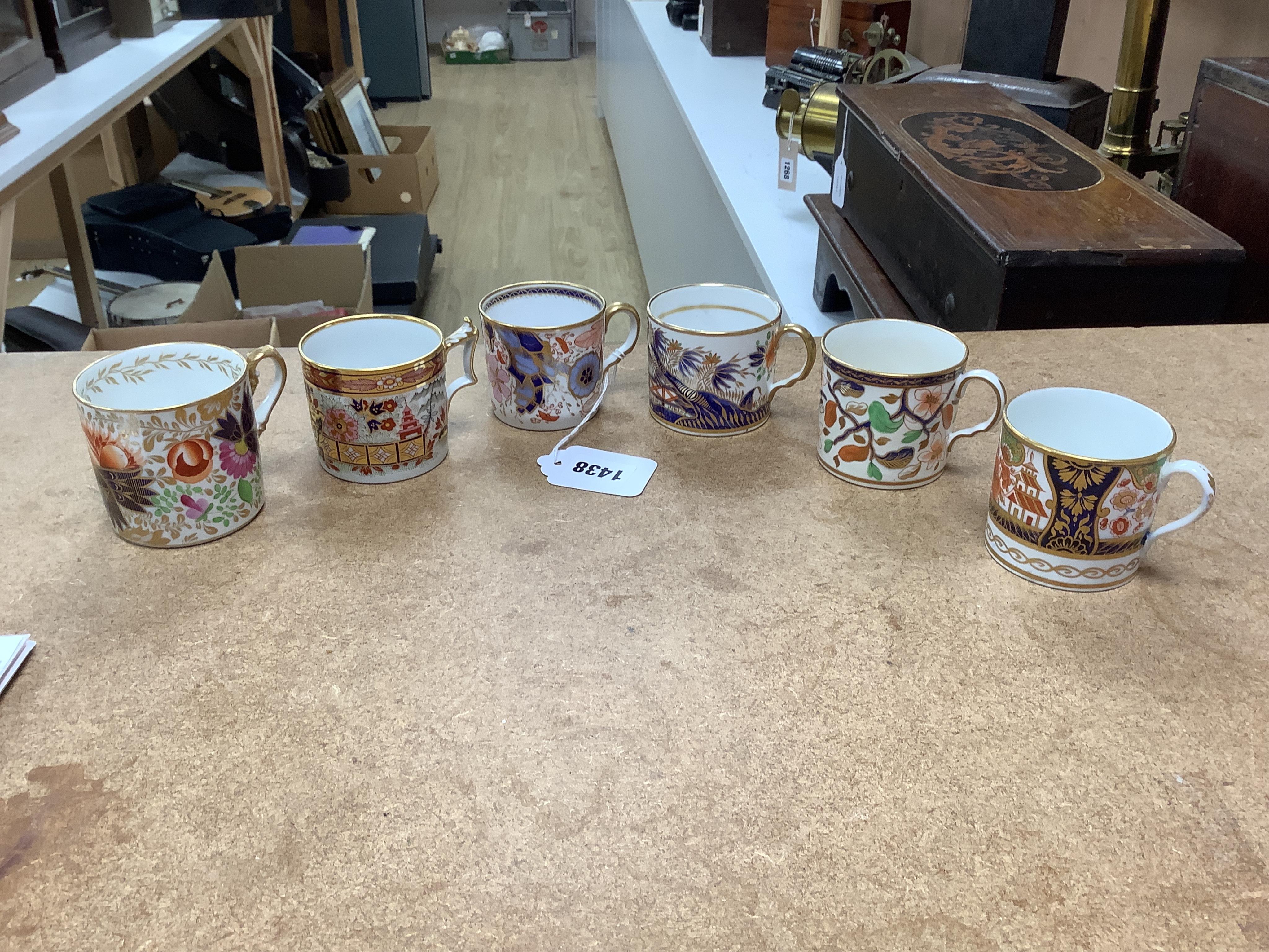 Twelve 1800-1820 English Imari patterned coffee cans